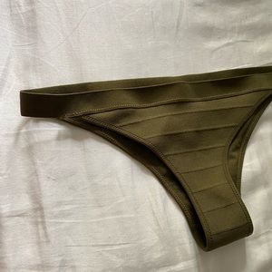 Cheeky bikini bottoms Size 4. Never worn. Brazilian fit.